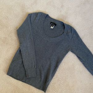 I'm selling a long sleeve dark gray size M sweater.